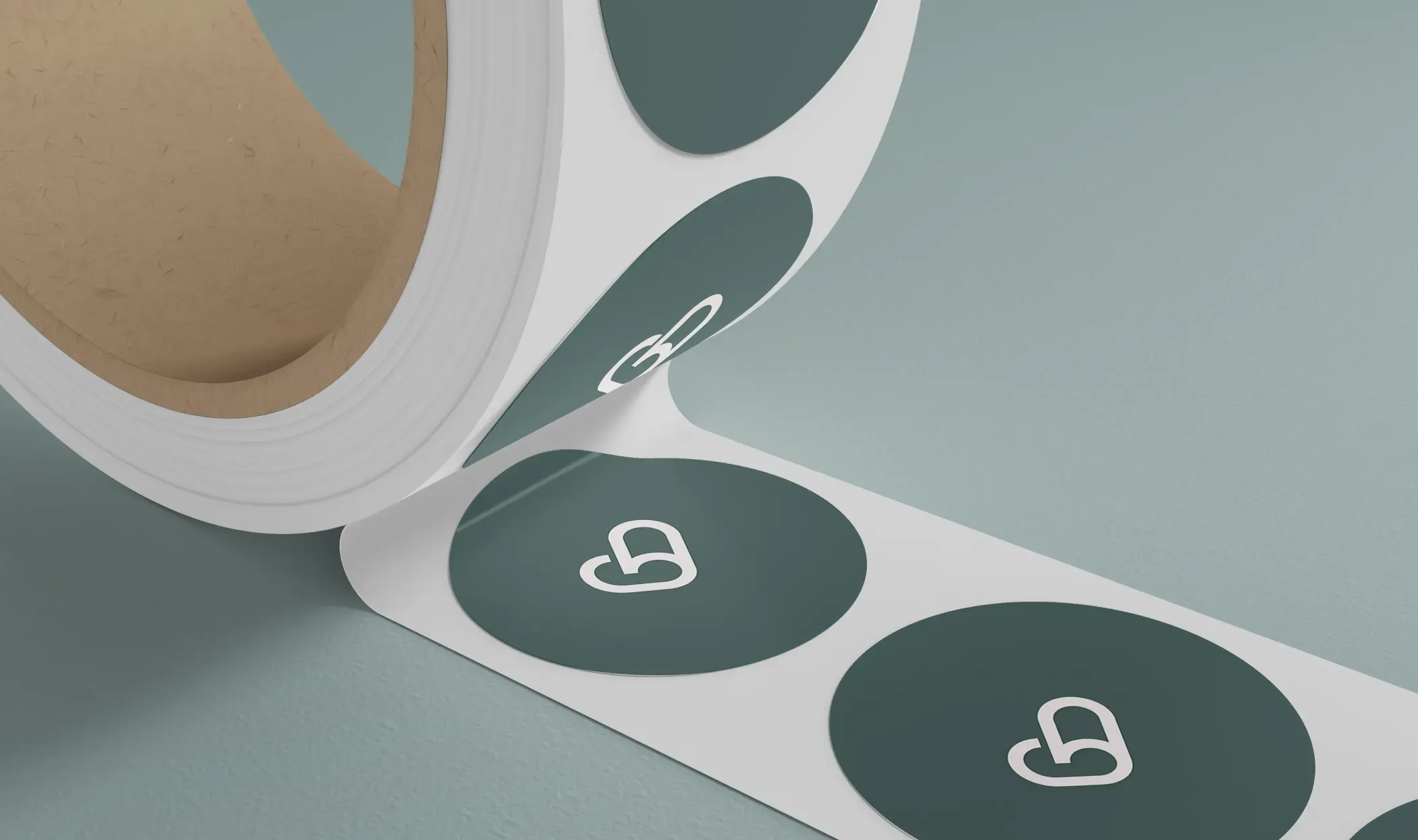 Roll of round clear labels printed with the Viva Magenta heart logo